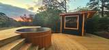 Private wood-fired hot tub deck at the dome