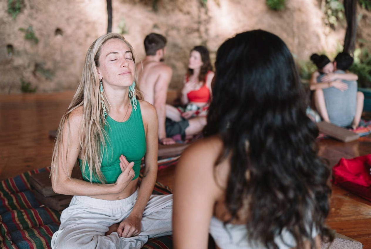Two participants sharing a close, present moment
