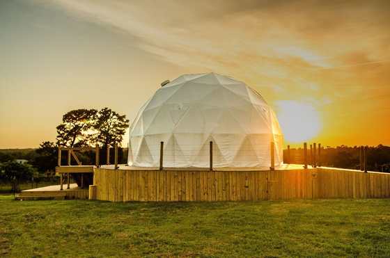 The geodesic dome at Golden Pine Village at sunset
